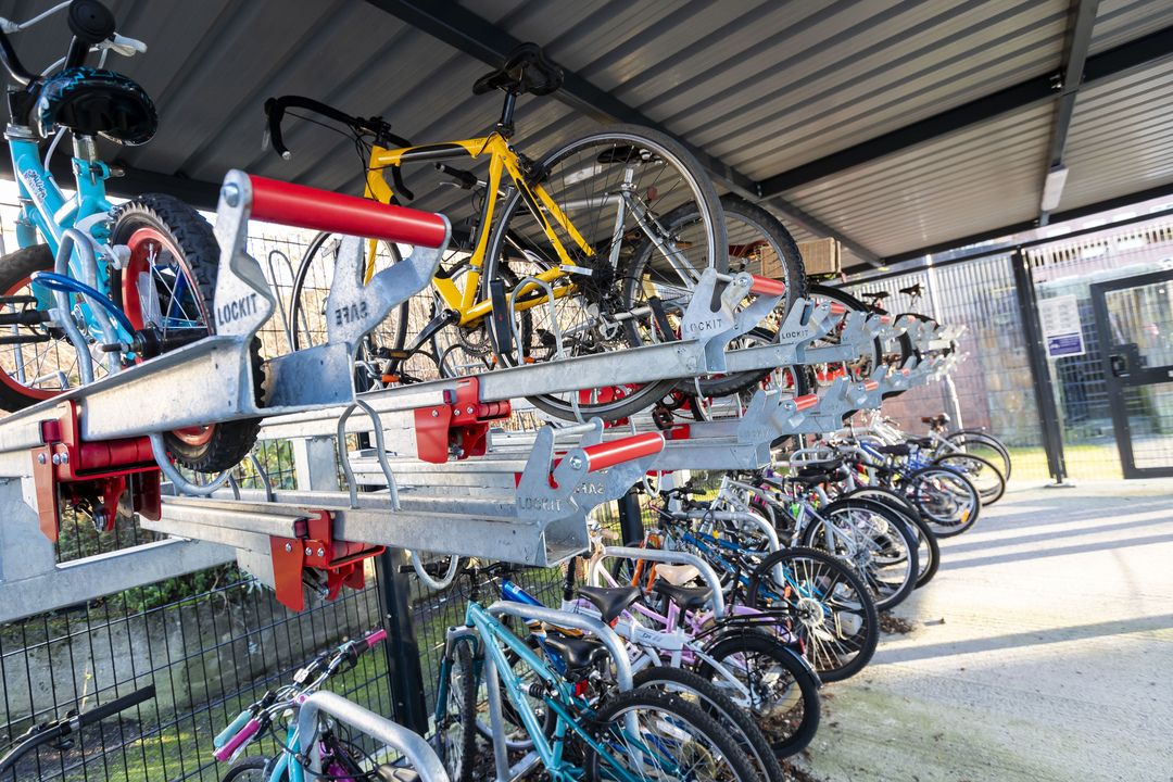 A range of bikes stored inside the new cycle storage unit at Queen's Cross Housing Association