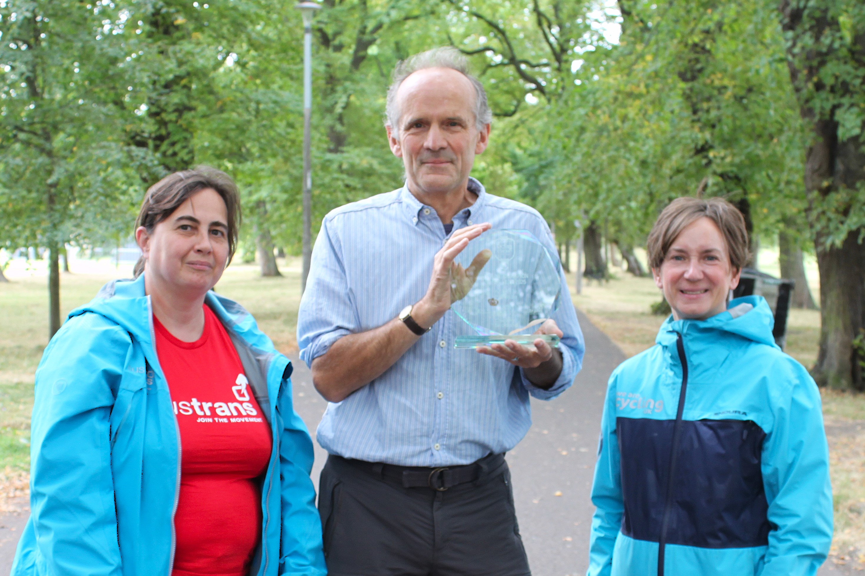 Phil Noble, 2025 Cycling Champion of the Year (centre), pictured with Cecilia Oram (Sustrans, left) and Suzanne Forup (Cycling UK, right)