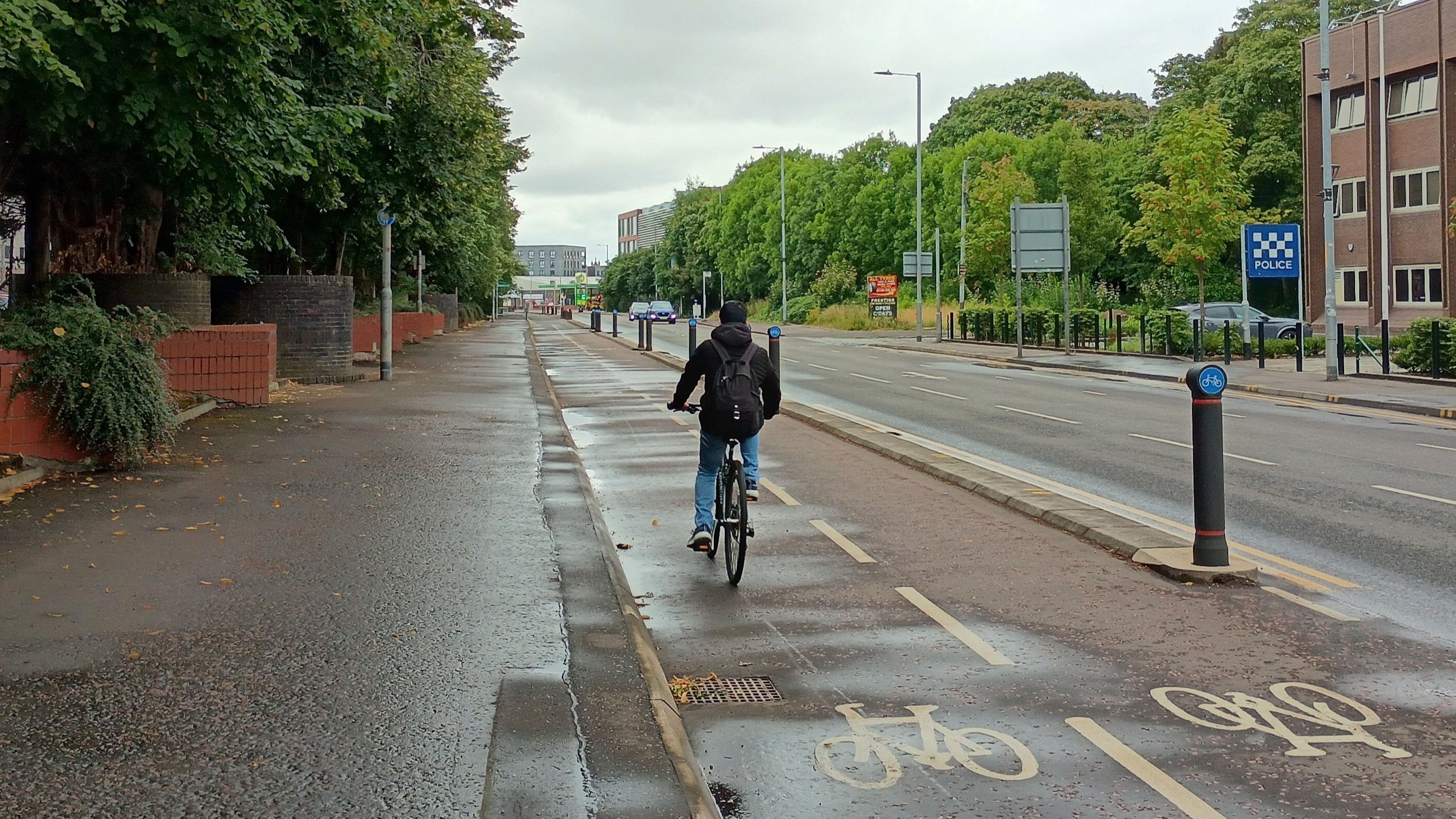 A person cycles along Glasgow's East City Way protected cycle route