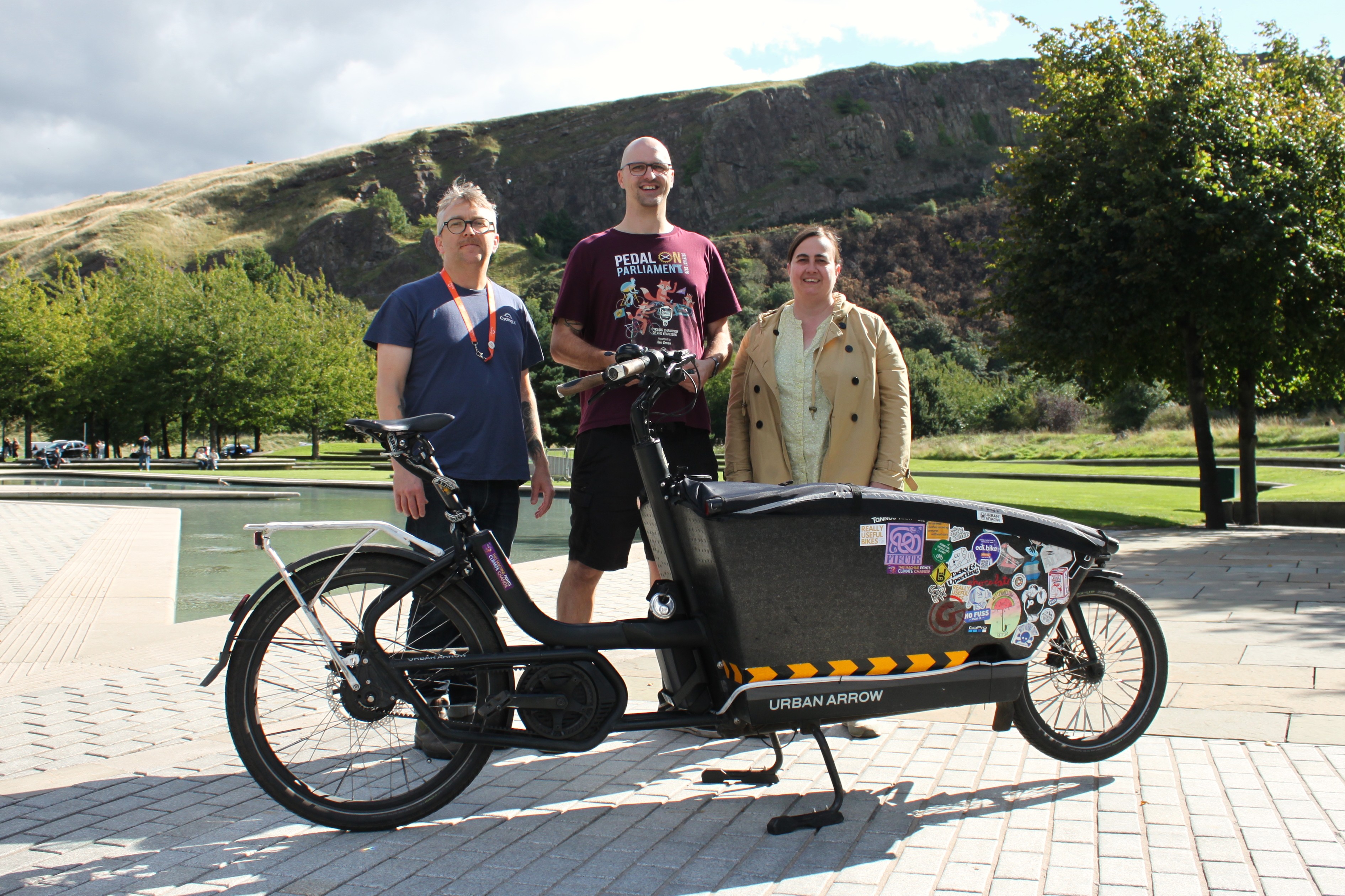 Cycling Champion of the Year 2026, Ben Seven, pictured in front of the Scottish Parliament